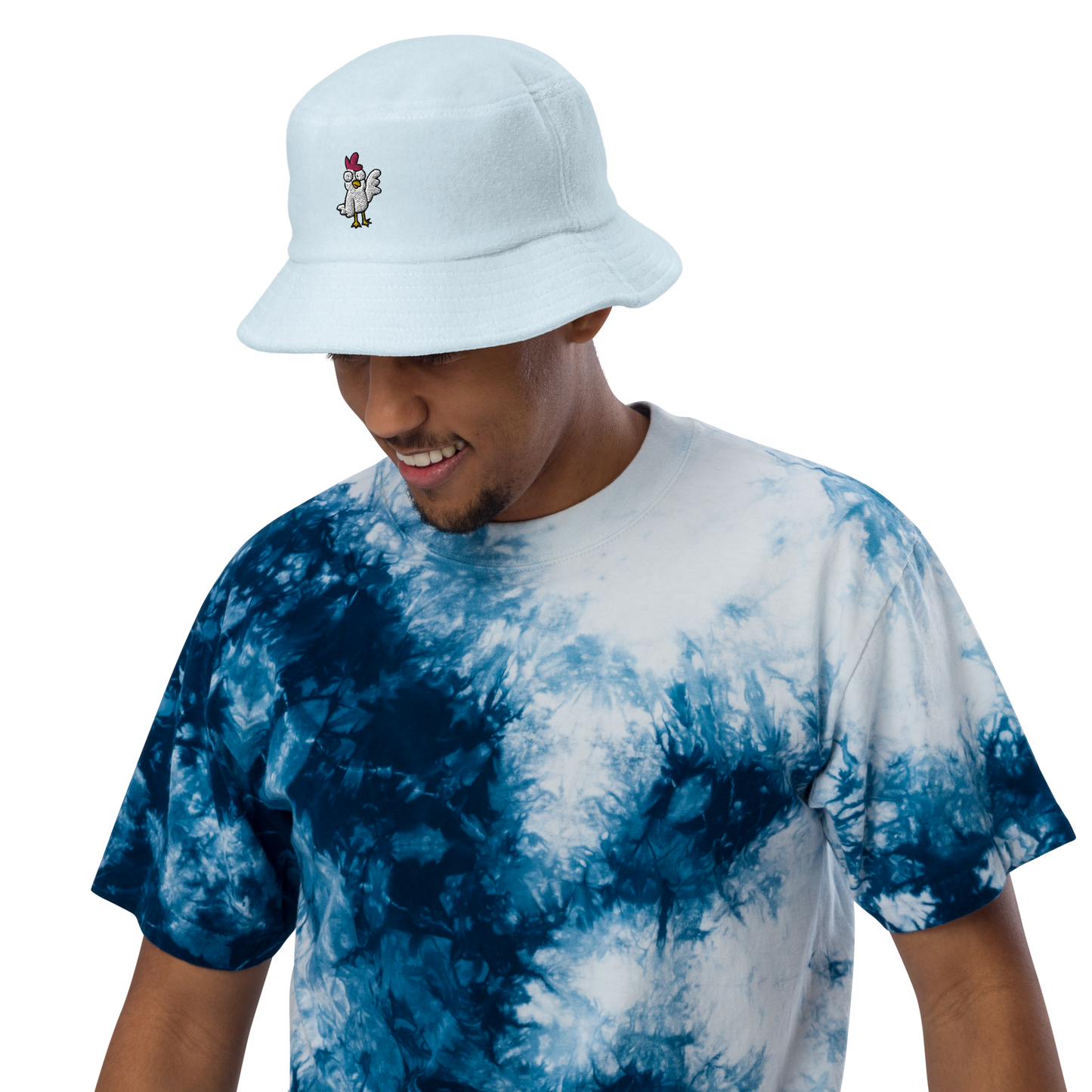 Terry Cloth Bucket Hat - ChickenBeat the heat and keep your cool with the coolest chicken in the galaxy on this soft terry cloth bucket hat. Comes in several different colors to suit your moods andCosmic IndustriesCosmic Industries